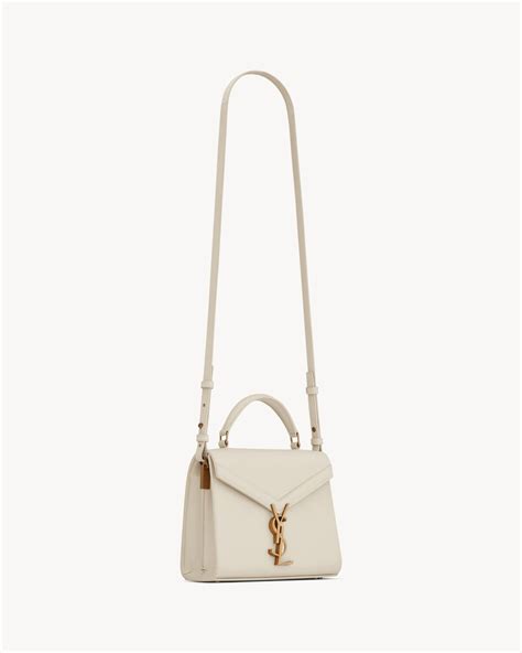 ysl cassandra beige|CASSANDRA Mini top handle bag in grain de poudre embossed .